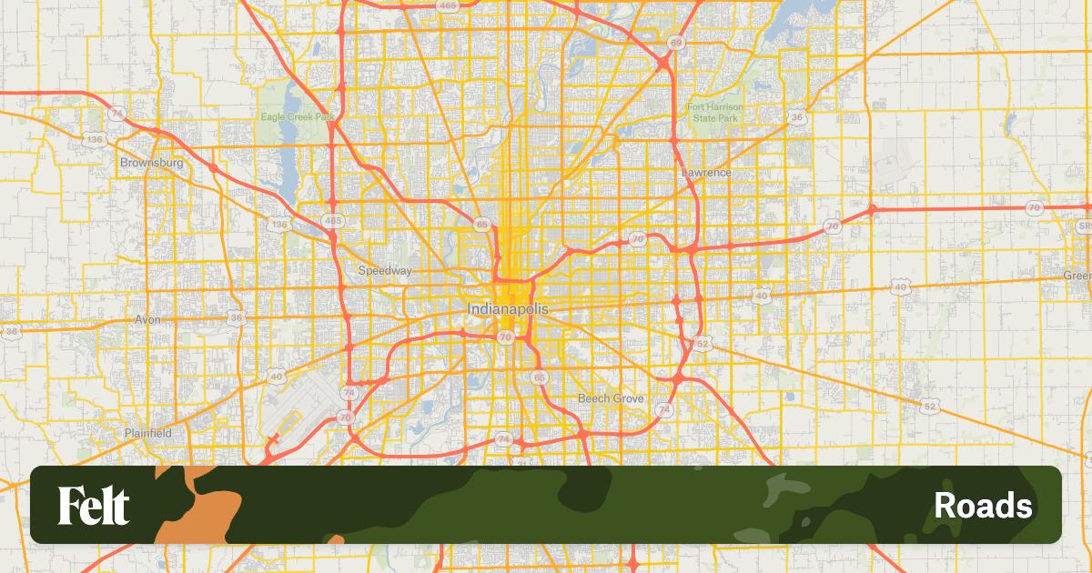 Indiana city street with traffic lights and pedestrians